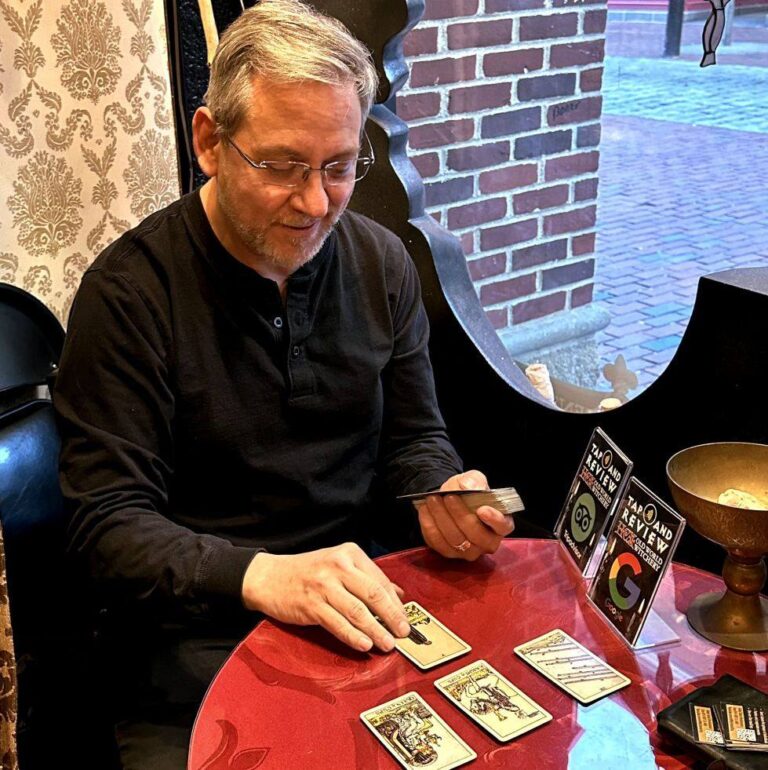 Jamie speaking at a table